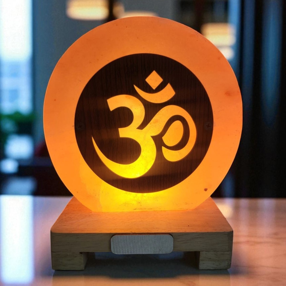 Wooden lamp with Om symbol on a blurred background