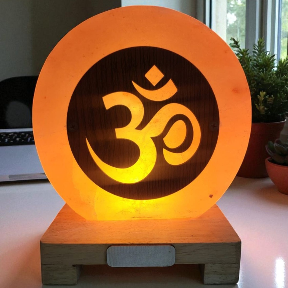 Decorative lamp with Om symbol on a wooden base
