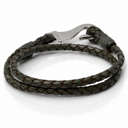 A dark brown braided leather wrap bracelet with a polished silver-tone metal lobster clasp, displayed on a clean white background.