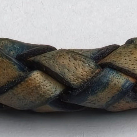 Braided leather bracelet with a metal clasp on a light gray background