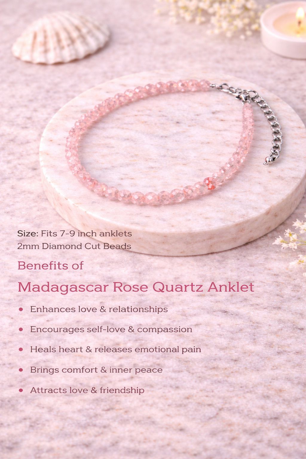 Pink beaded anklet on a stone surface with shell and candle in the background