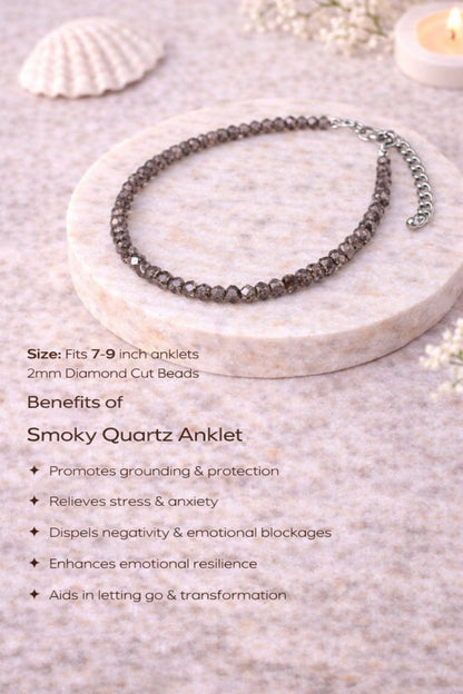 Smoky Quartz anklet on a stone surface with product details and benefits listed.