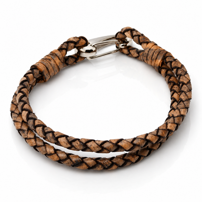 A double-strand braided leather bracelet in shades of brown with a polished silver-tone metal clasp, shown on a clean white background.