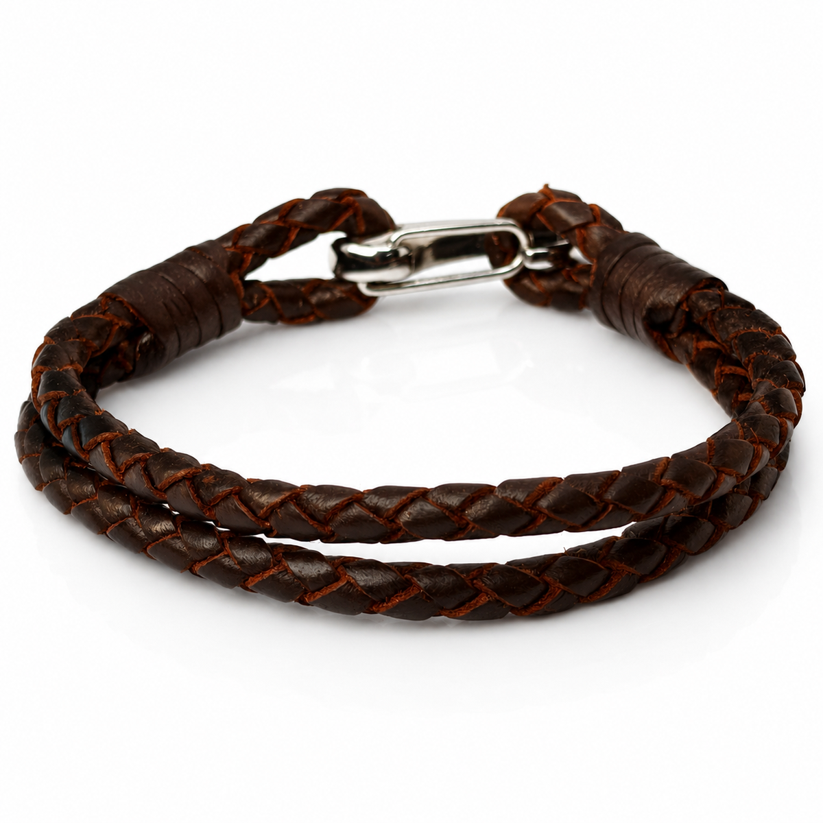 A dark brown braided leather bracelet with a silver metal lobster clasp, displayed on a clean white background.