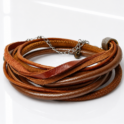A multi-strand wrap bracelet made of brown leather with a silver-tone chain extender and a small metal bead, displayed on a clean white background.