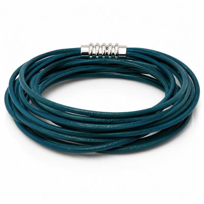 A multi-strand wrap bracelet made of dark teal green cord, featuring a silver metal spring clasp, shown on a clean white background.